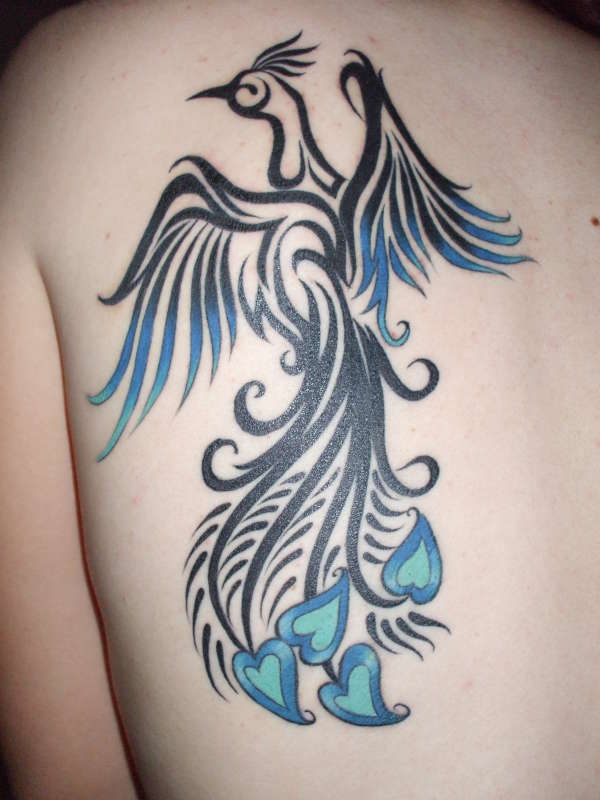 Change your look with stylish Peacock Tattoos