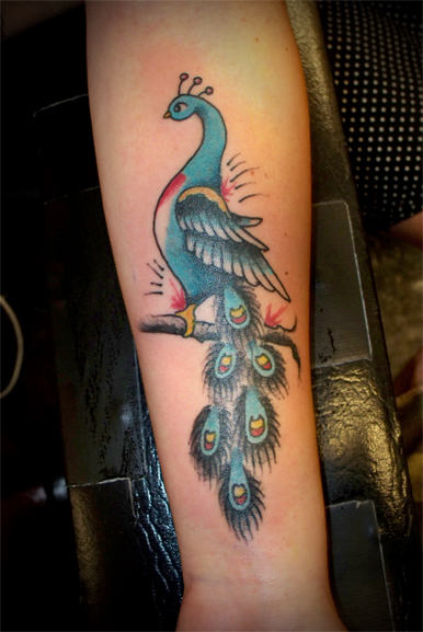 Change your look with stylish Peacock Tattoos
