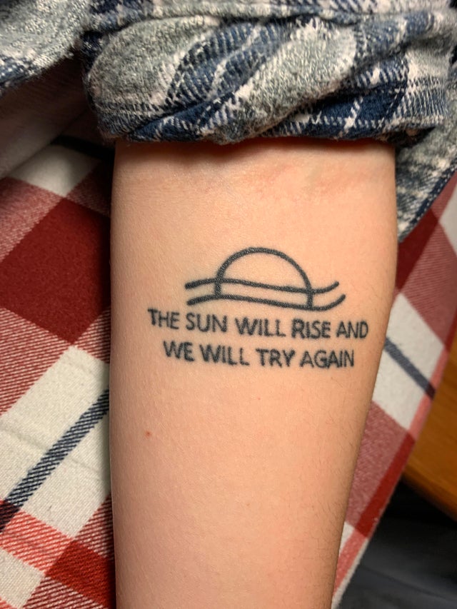 the sun will rise and we will try again I thought Id join in and show my  tøp tattoo that I got over a year ago  rtwentyonepilots