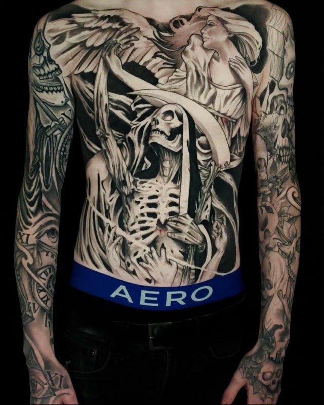 Justin Bieber Covers His Entire Torso in One Giant Tattoo  E Online  CA